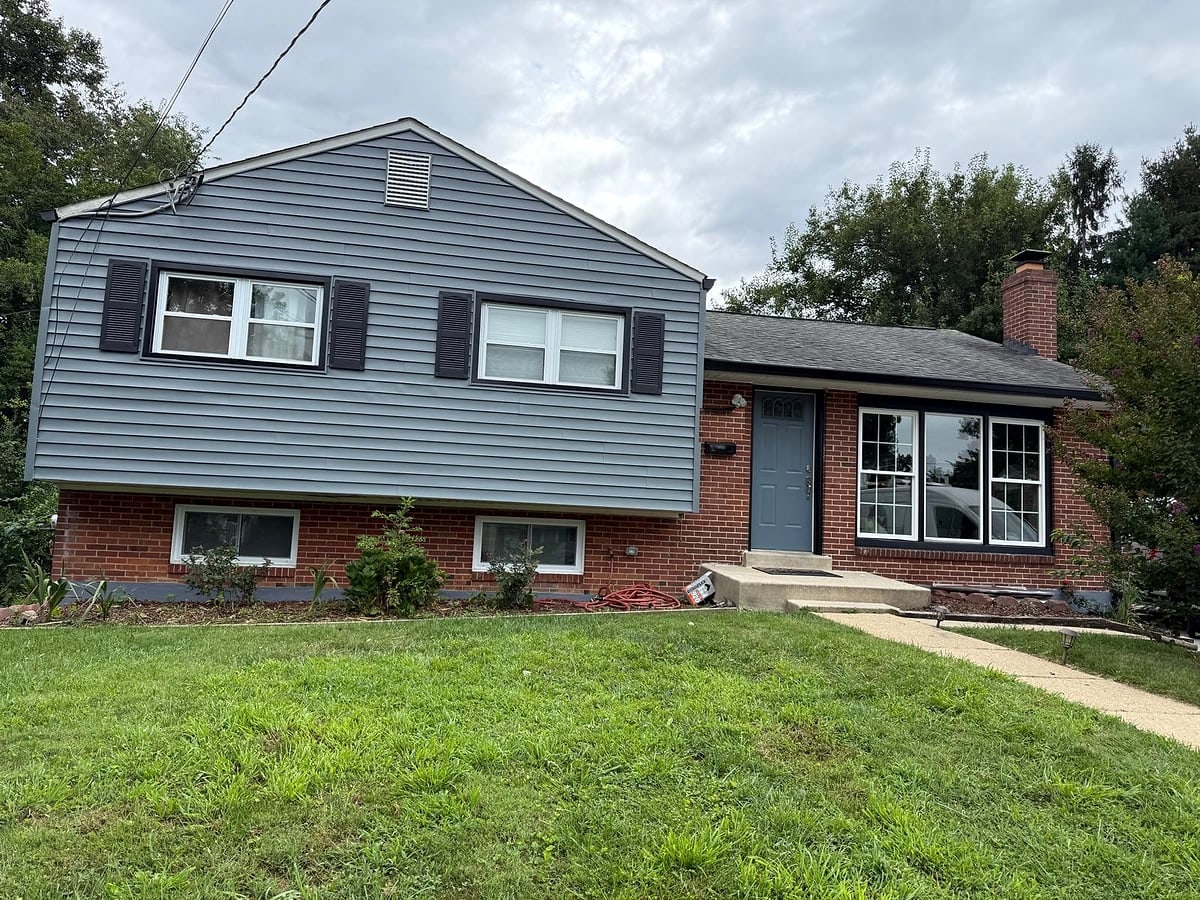 Siding & windows: New gray siding, shutters and windows