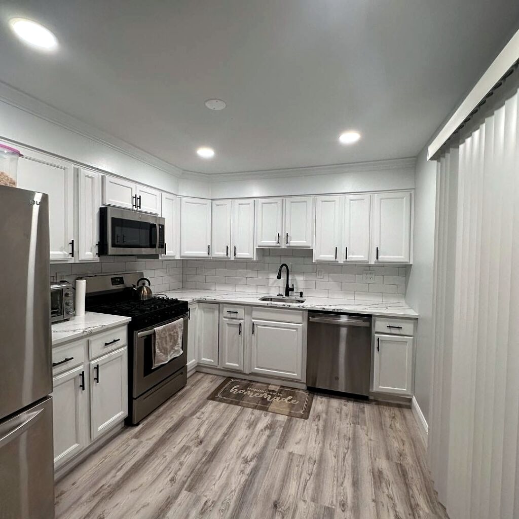 Kitchen remodel: White shaker cabinets and stainless appliances